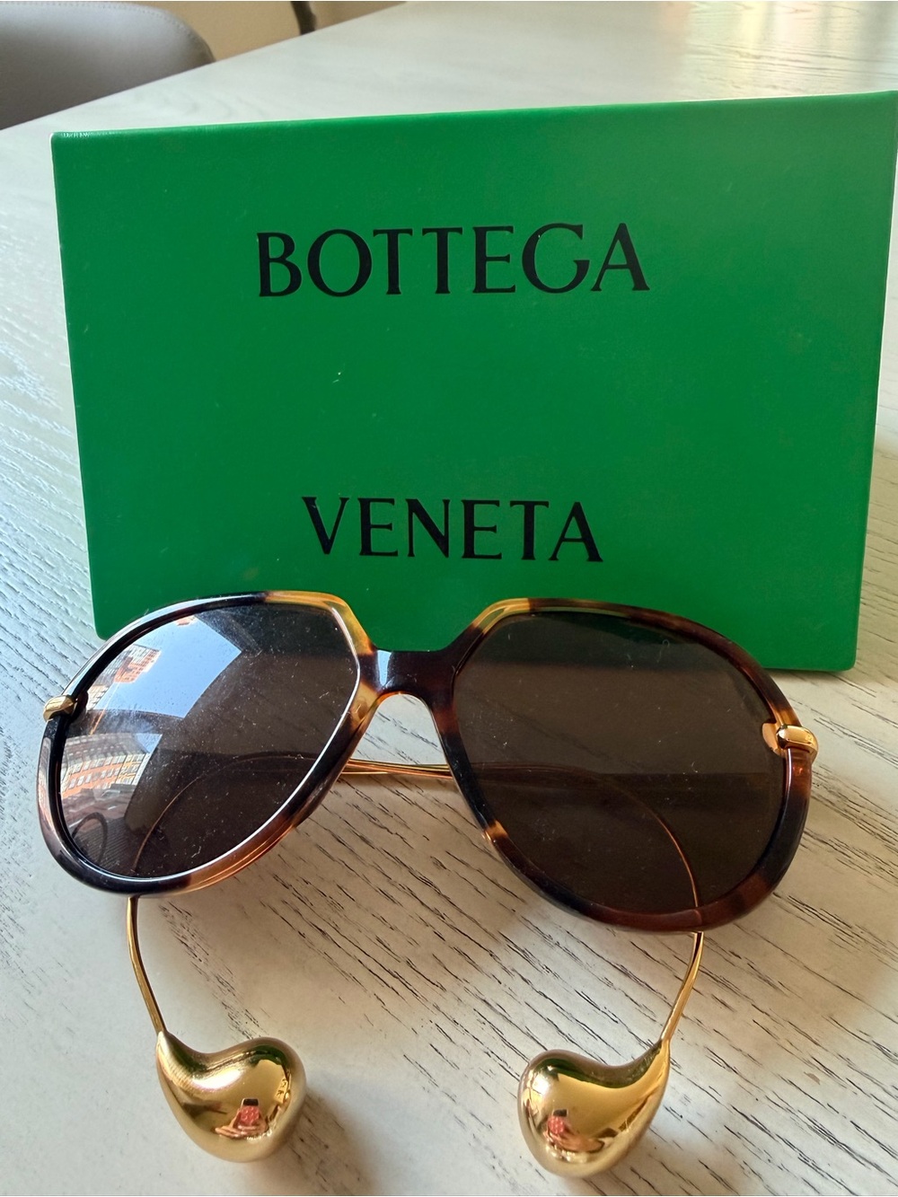 Bottega Veneta Tortoiseshell Sunglasses with Gold Temples